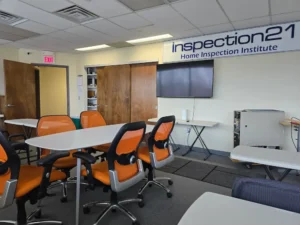 Home inspector training classroom at Inspection21 Paramus NJ campus with student seating and instruction