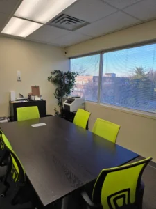 Training conference room at Inspection21 Paramus NJ campus with seating and presentation screen